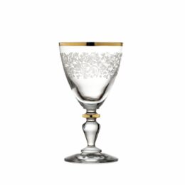 Eloise wine glass with gold garden decoration, geometric lines and floral designs, laser-cut to create a pantograph effect and gold border
